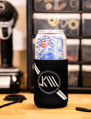 Jeff Kendall-Weed branded beer can koozie in black and white. 